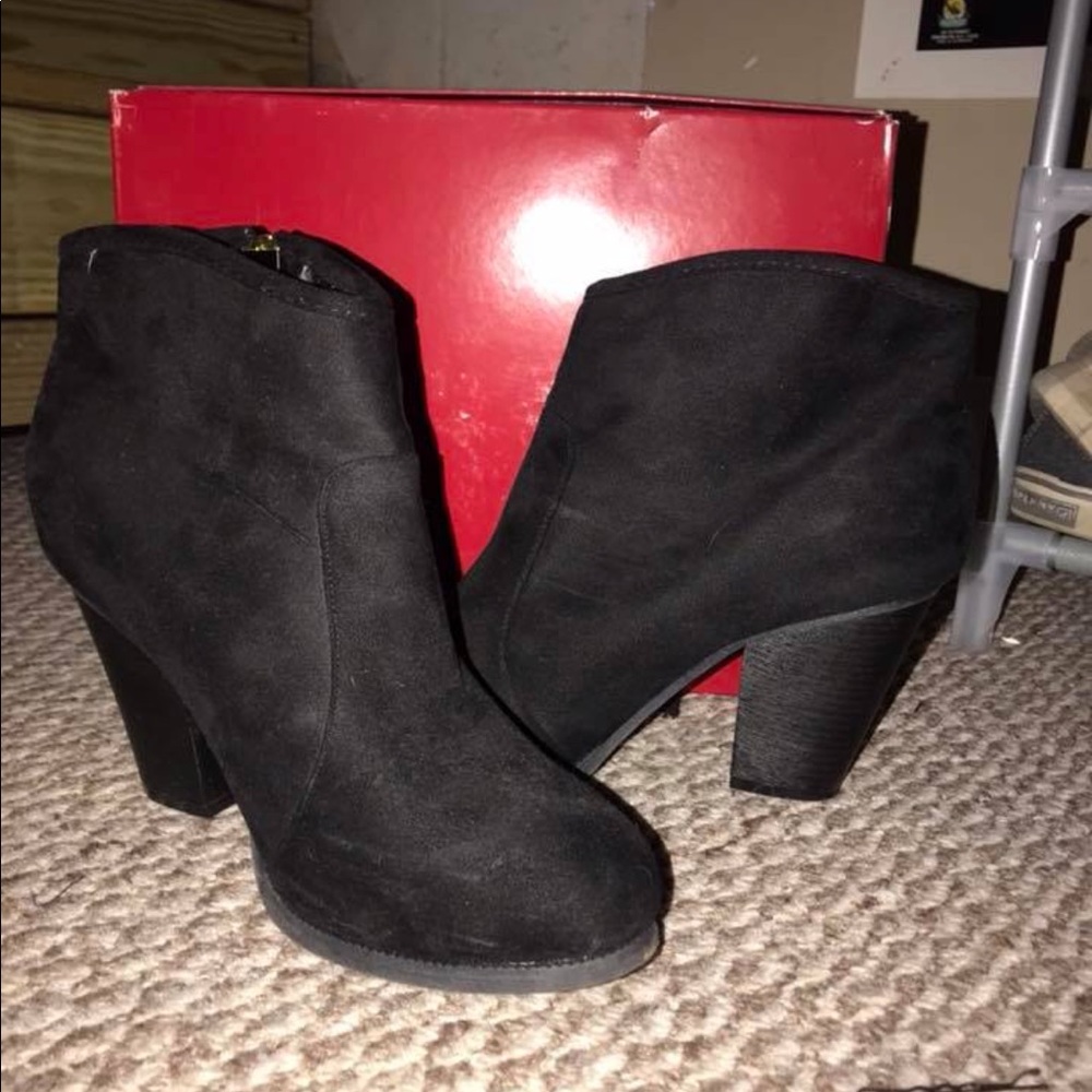 **sold**Black booties